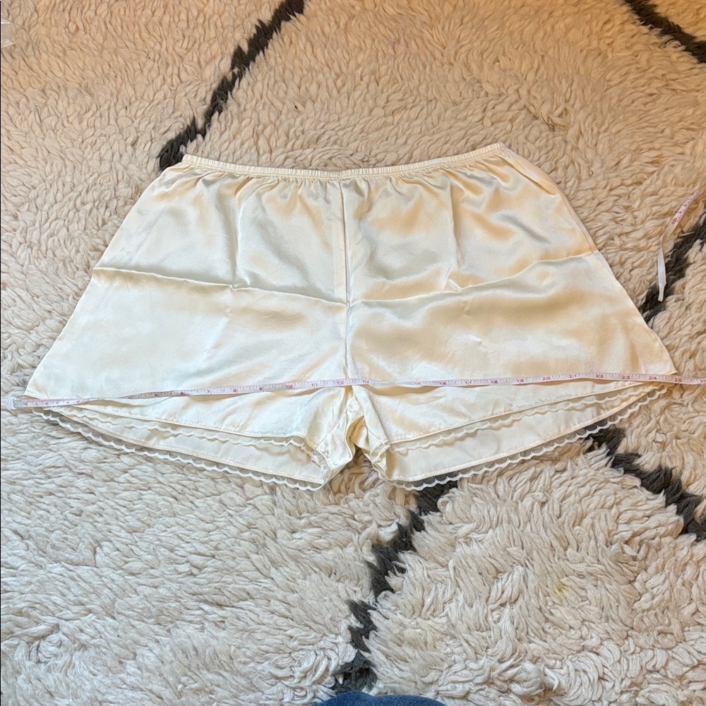 DONNI. Silk Tap Shorts in Light Yellow - Picture 15 of 17